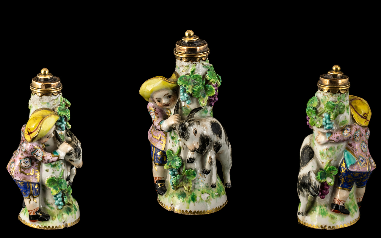 Porcelain And Gold Scent Bottle (18th Century) Modelled as a Goat Herder with Goat. (We Suspect This