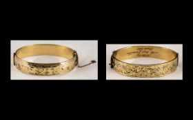 9ct Gold and Metal Core Hinged Bangles. Marked 9ct and Metal Core.