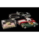 Four Various Vintage Toy Cars comprising Urago- Jaguar XK 120, 7 inches (17.