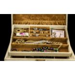 Collection of Quality Costume Jewellery, housed in a large cream jewellery box,