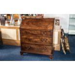 Georgian Mahogany Bureau of small size, with a fitted interior and three long drawers,