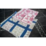 Two Antique Quilts, one measures approx 6' x 6' 6" and is in a cream and blue colourway,