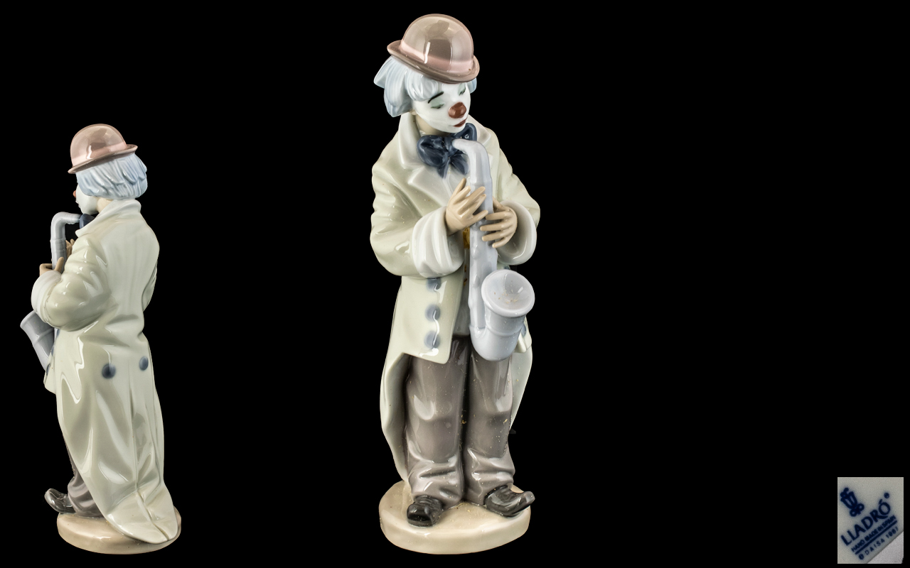 Lladro - Hand Painted Porcelain Figure ' Sad Sax ' Model No 5471. Designer Francisco Catala.
