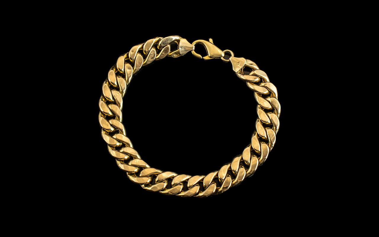 9ct Gold - Gents or Ladies Curb Bracelet with Good Clasp. Marked for 9.