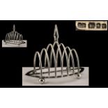 Art Deco Period Large and Impressive Six Tier Toast rack, Standing on 4 Ball Feet.