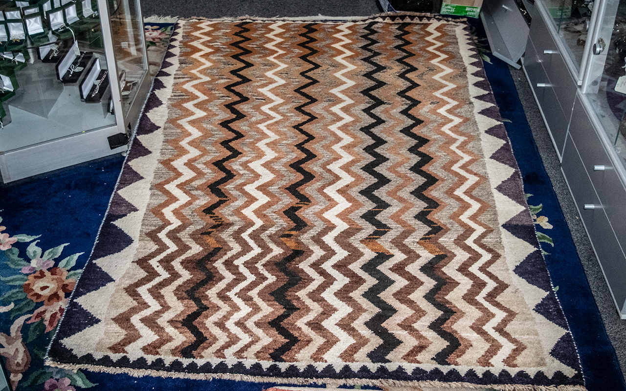 Iranian Tribal Carpet with an interlacing chevron design in brown hues. Size 80" x 49".