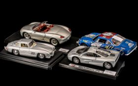 Four Urago Italian Made Collectors Car Models, comprising Mercedes-Benz 300SL 1954, McLaren FI 1993,