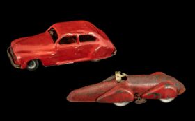 Unusual Key Wind Tinplate Vintage Racing Car with driver in red livery; no maker's marks,