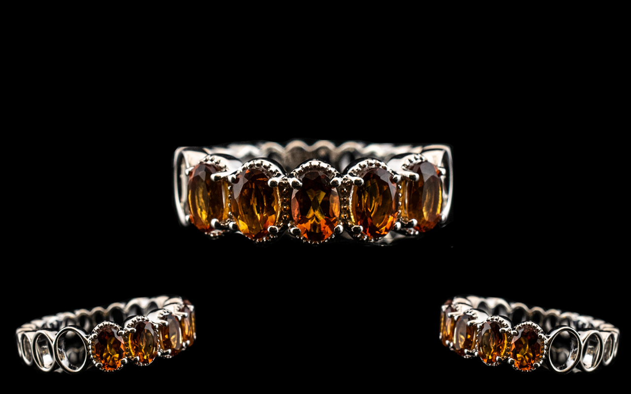 Madeira Citrine Band Ring, five oval cut, deep, warm Madeira citrines totalling 2cts, held within