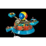 Tinplate Key Wind Rotating Fairground Ride, c1960s, made in China, working condition; 9 inches (app.