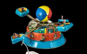 Tinplate Key Wind Rotating Fairground Ride, c1960s, made in China, working condition; 9 inches (app.