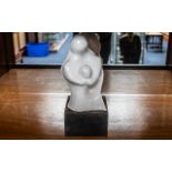 Henry Moore Style Figure raised on a wooden block, measures approx 12'' tall.
