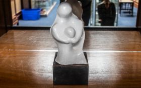 Henry Moore Style Figure raised on a wooden block, measures approx 12'' tall.