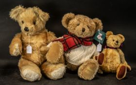 Three Teddy Bears, comprising a large vintage Bear in golden fur, with moveable arms and legs,