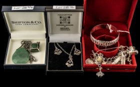 A Small Mixed Collection of Silver Jewellery to include a charm bracelet loaded with 12 charms,