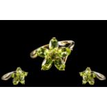 Peridot Flower Cluster Ring, five oval, luscious green peridot 'petals' totalling 2.