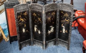 Chinese Fire Screen in four panelled parts, black, decorated with carved bone figures and floral