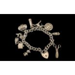 Vintage Sterling Silver Charm Bracelet - Loaded with 10 Silver Charms,