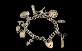 Vintage Sterling Silver Charm Bracelet - Loaded with 10 Silver Charms,