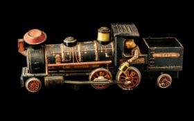 Mid-Century Tin Plate Train - Tin plate train engine. Measures 16" in length.