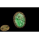 Antique Chinese Green Jade Brooch in a fancy yellow surround,