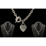 Tiffany & Co Sterling Silver Necklace with Attached Heart Shaped Tag, Which Reads Tiffany & Co,