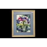 Helen Schofield Water Colour depicting a vase of Anemones in rich colours. Mounted and framed behind