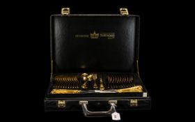 A 70 Piece Gold Plated Bestecke Solingen German Cutlery Set, in fitted case,