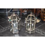 A Pair of Reproduction Brass Hanging Lanterns Electrified with Bevel glass panels in the traditional