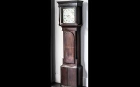 A George III Oak Cased Long Case Clock, eight day movement, painted dial with Roman numerals.