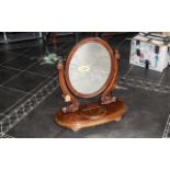 Victorian Mahogany Dressing Table Mirror, oval shaped raised on a semi-circular plinth, with opening