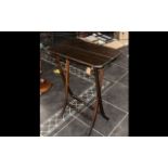 Mahogany Folding Table with cross supports, measures 62 cm wide x 30 cm deep x 76 cm tall approx.