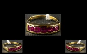 Asscher Cut Ruby Band Ring, a row of five rubies of excellent colour, with the rare Asscher cut,