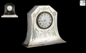 Edwardian Silver Miniature Dressing Table Clock with a white enamel dial and Swiss movement; maker