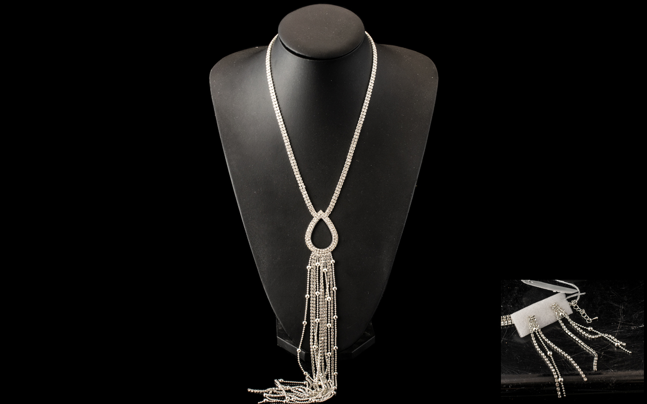 White Austrian Crystal Very Long Tassel Necklace and Matching Earrings,