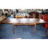 G Plan Danish Extending Teak Table with sliding supports at ends to hold two leaves,