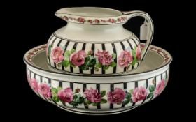 George Jones Pottery Washbasin & Jug in pink rose pattern, bowl diameter 15", jug height 9".