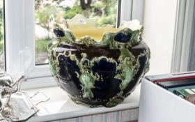 A Large French Antique Majolica Plant Pot, as found condition. Pot measures 13" x 17".