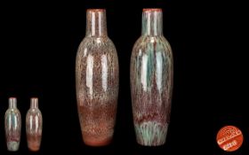 A Pair of Large Bretby Vases, with Ruskin type drip/mottle glazes in reds and pale greens.