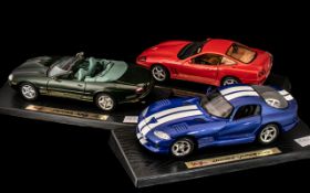 Three Maisto Model Collectors Cars on Stands, comprising Dodge Viper GTS 1996, 550 Maranello 1996,