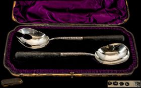 Victorian Period Pair of Sterling Silver Salad Servers with Black Ebony Handles.