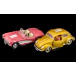 Two Urago Italian Made Collectors Car Models on Stands, comprising VW Beetle 1,000,000,