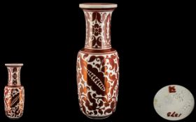 Burmantofts Vase by Leonard King, a rare red lustre Persian style vase,