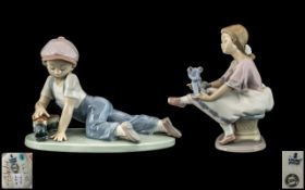 Lladro Collectors Society Members Pair of Hand Painted Porcelain Figures.