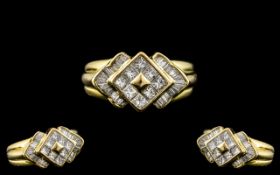18ct Yellow Gold - Attractive Princess Cut and Baguette Cut Diamond Set Ring of Excellent