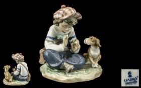 Lladro - Hand Painted Porcelain Figure ' I Hope She Does ' Model No 5450. Designer Regino Torrijos.