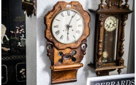 A Walnut Drop Dial Wall Clock, of typical form, painted dial with Roman numerals, needs pendulum.