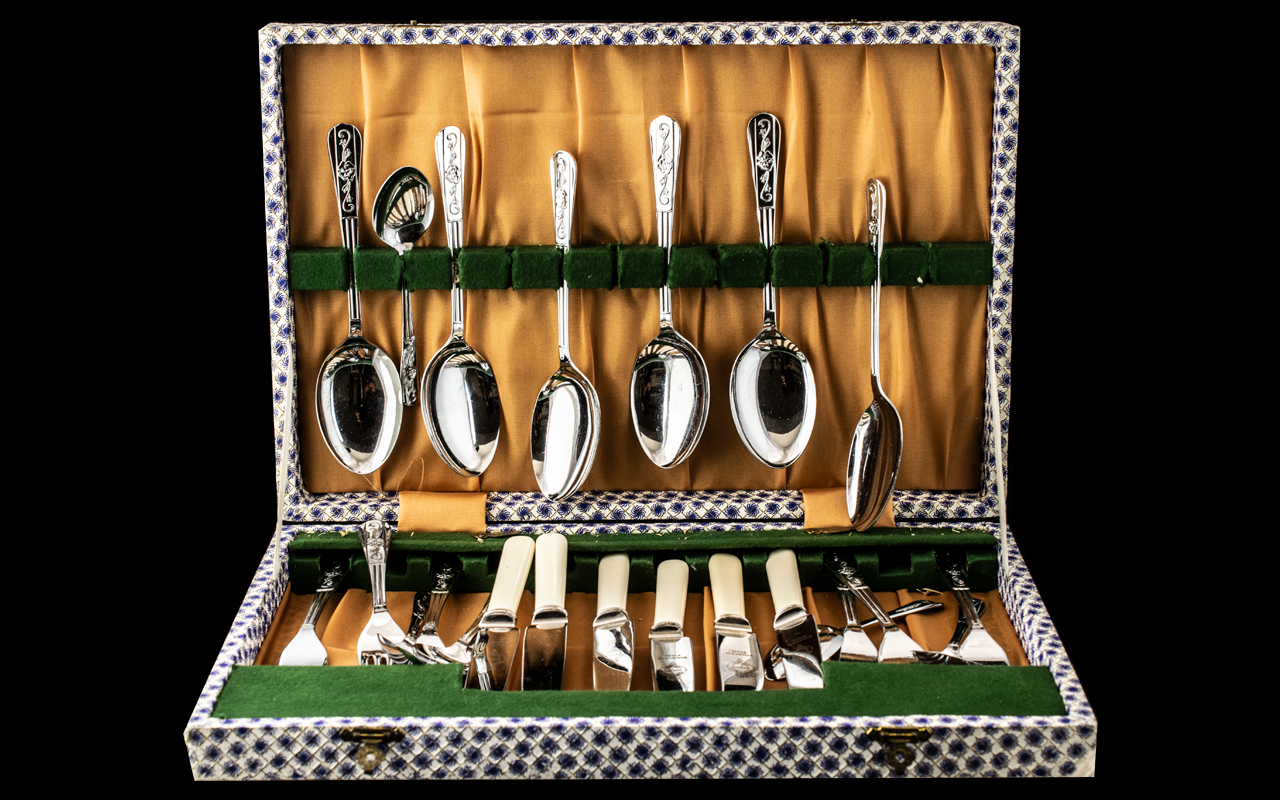 Boxed Set of Cutlery, setting for 6, in stainless steel with embossed pattern to handle.