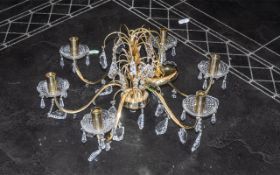 A Reproduction Brass and Crystal Drop Glass Chandelier in the French Style electrified, with 6