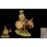 Beswick 'Susie Jamaica' Figure of a lady on a donkey, Beswick No. 1347. This has the rare gold